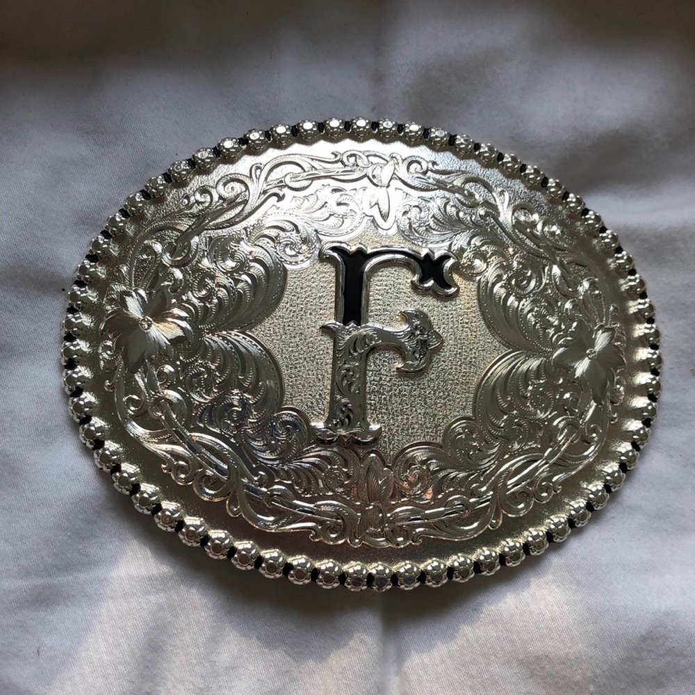 New Montana Silversmiths belt buckle F logo